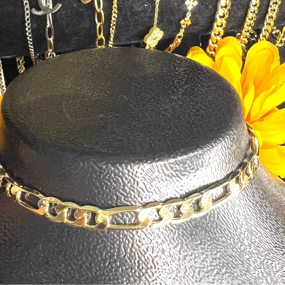 18 it gold plated, Figaro chain, 24”